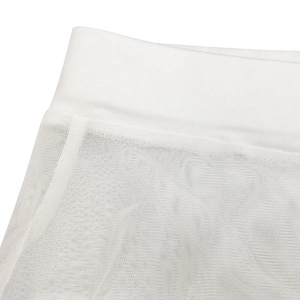 Detail of white sheer mesh fabric showing wide elastic waistband and breathable texture