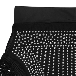 Close-up of black mesh dress featuring sparkling rhinestones and long fringe detail