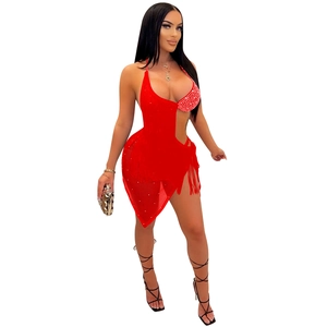 Detail of red asymmetric fringe dress with rhinestones and sexy cut-out waist design