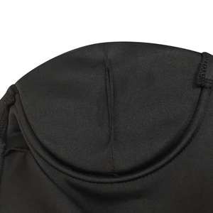 Detail of chest pad insertion slot on black strapless dress with high-density knit fabric