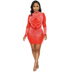 Detail of red mesh bodycon dress featuring white rhinestones and a high-neck design