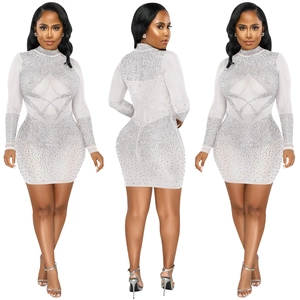 Detail view of mesh rhinestone mini dress with high neck and long sleeves in slim fit