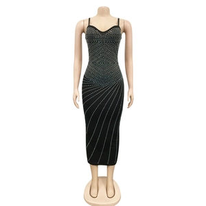 Detailed view of the rhinestone pattern on this sexy black bodycon strap dress