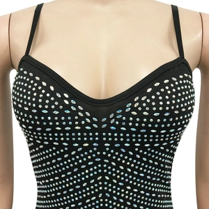 Detail of black rhinestone camisole dress with sparkling crystal embellishments