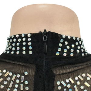 Detail of sheer black mesh high neck dress with rhinestones and invisible back zipper