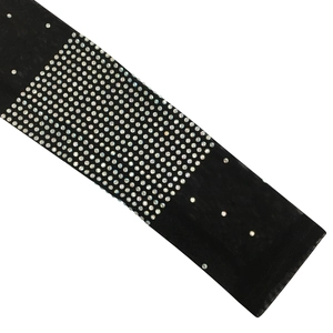 Detail of black mesh dress fabric featuring multi-row colorful rhinestones texture