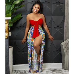 Detail of red tube top with bow tie and high slit floral print chiffon skirt set