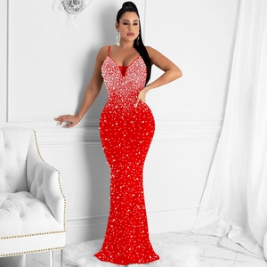 Detail of red floor-length fishtail dress with gradient rhinestones and slim straps