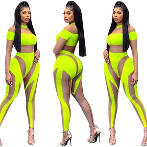 Drei-Winkel-Ansicht von Neongrün-Mesh-Set mit Langarm-Oberteil und Skinny-Leggings