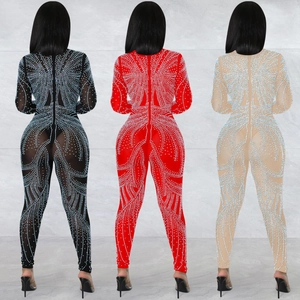 Detailed back view of rhinestone mesh jumpsuits in black, red, and nude colors