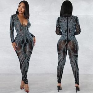 Sexy black mesh jumpsuit with long sleeves, deep V-neck and blue rhinestone patterns