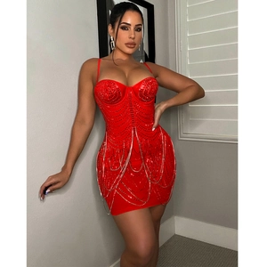 Detail of red bodycon mini dress with luxury rhinestone fringe and corset bodice design