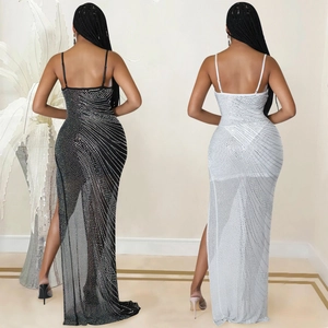 Detail view of rhinestone patterns on black and white sheer mesh evening dresses