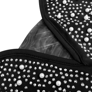 Close-up of black mesh dress featuring elegant white pearls and sparkling silver rhinestones