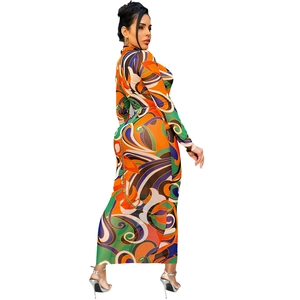 Detail view of fitted maxi dress with vintage geometric swirl print and metal waist chain