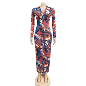 Detail of the colorful abstract swirl print on this long sleeve mesh maxi dress