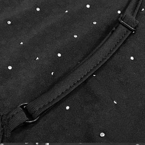 Detail of adjustable strap and silver rhinestones on black sleeveless dress fabric