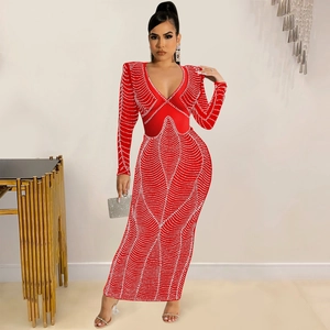 Detail of red deep V-neck evening dress with rhinestone wave patterns and slim fit cut