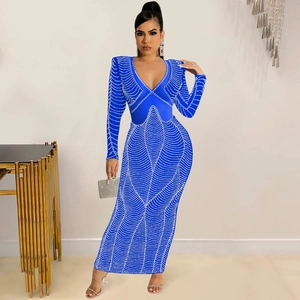 Detail of royal blue bodycon dress featuring shimmering sequin patterns and a deep V-neck