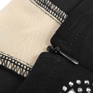 Detailed macro view of black mesh fabric with rhinestones and an invisible zipper closure