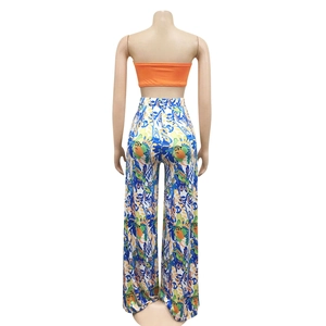 Back view of high-waist wide-leg pants with vibrant abstract geometric art prints