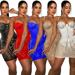 Detail view of sparkly rhinestone fringe bodycon dresses in black, red, blue, nude and white