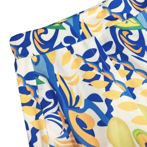 Close-up of bohemian floral print waist with precise double stitching on fabric