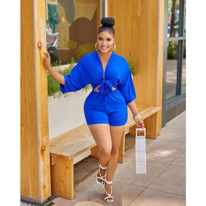 Detail of royal blue v-neck tie-front crop top and matching high-waisted shorts set