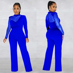 Women's blue mesh jumpsuit with polka dot sleeves and elegant wide-leg trousers