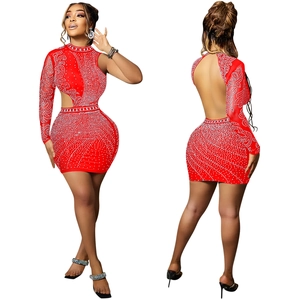 Detail of red rhinestone mini dress with one-sleeve design and side cutout features