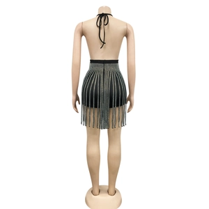 Rear view of sexy black backless halter set with shimmering rhinestone fringe details