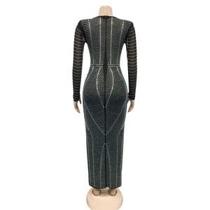 Detailed back view of sexy black mesh maxi dress with sparkling rhinestone wave patterns