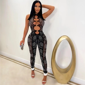 Sheer mesh jumpsuit for women with rhinestones, cut-out details and metal rings