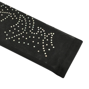 Detailed view of black mesh fabric featuring iridescent rhinestones in a wave pattern