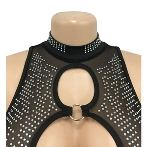 Close-up of black sheer mesh jumpsuit featuring rhinestones and chest cutout detail