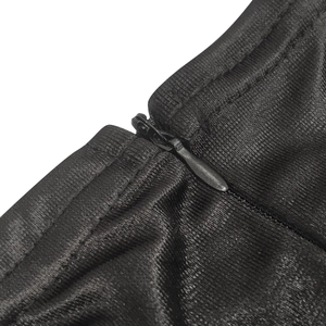 Macro shot of invisible zipper on sleek black satin fabric showing fine stitching detail