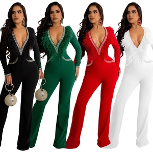 Close-up of deep V-neck sequins and luxury feather trim detail on wide leg jumpsuit
