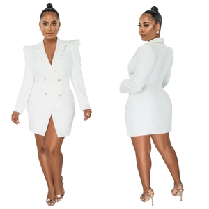 Detail of white double-breasted blazer dress with gold buttons and structured shoulders