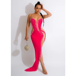 Detail of hot-drilled rhinestones on a hot pink V-neck sleeveless slit maxi dress