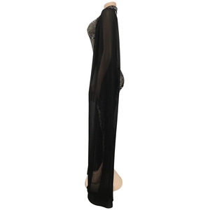 Detail showing sheer black mesh fabric with silver rhinestone embellishments on jumpsuit