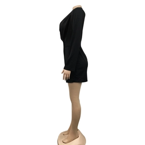 Side view of a slim-fit black long-sleeve blazer dress with lapel collar on a mannequin