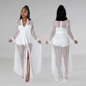 Elegant white mesh long sleeve jumpsuit with waist belt and side slit detail