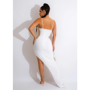 Detailed back view of white evening dress featuring sheer mesh inserts and pearl trim