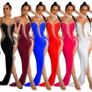 Detail view of rhinestone fishtail evening dress in six vibrant colors including red and black