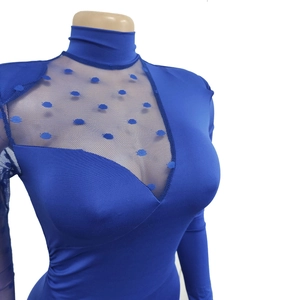 Detail of royal blue bodysuit featuring sheer mesh patchwork and polka dot embroidery