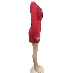 Detail view of red slim blazer dress featuring double-breasted gold buttons and lapel