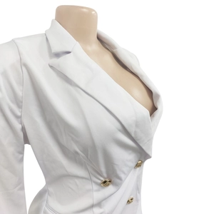 Detailed side view of white double-breasted blazer with golden embossed buttons
