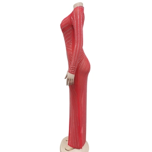 Close-up of red mesh evening dress with intricate silver rhinestone detailing and high collar