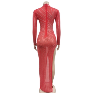 Detail of red mesh dress showing silver rhinestone stripes and high slit design