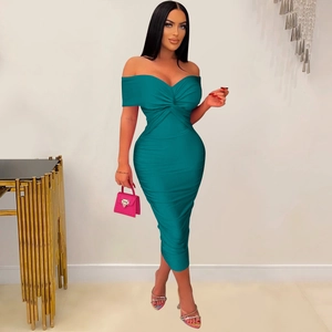 Detail of teal off-shoulder ruched dress with twist knot neckline and slim fit silhouette